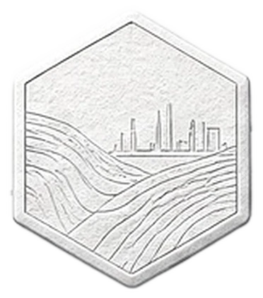 An embossed plate engraved with a city skyline beyond the fields